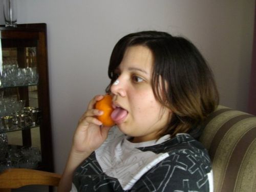 Girl Licking Orange Meme Template